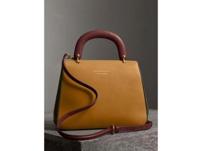 Shop Burberry The Medium Dk88 Top Handle Bag In Moss Green/ochre Yellow