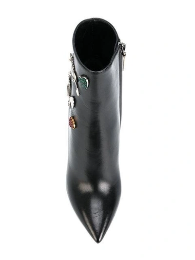 Shop Saint Laurent Embellished Niki 85 Asymmetric Boots - Black