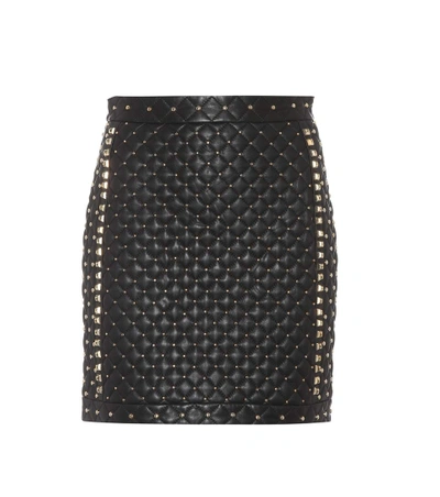 Shop Balmain Studded Leather Mini Skirt In Black