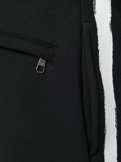 Shop Neil Barrett Stripe Detail Track Pants - Black