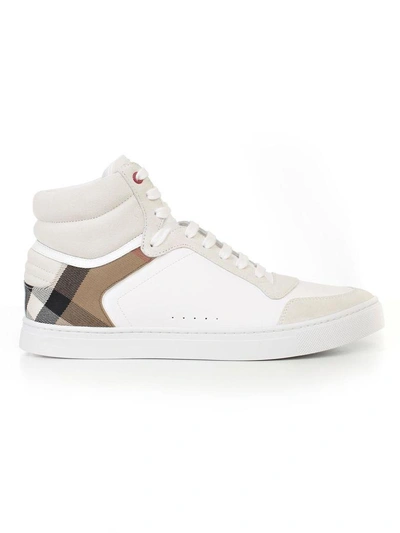 Shop Burberry Sneakers In White