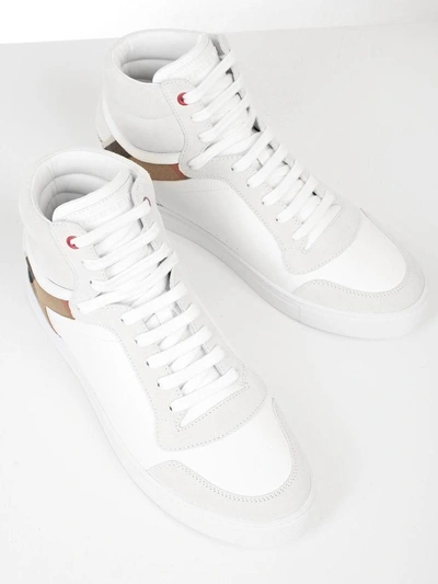 Shop Burberry Sneakers In White