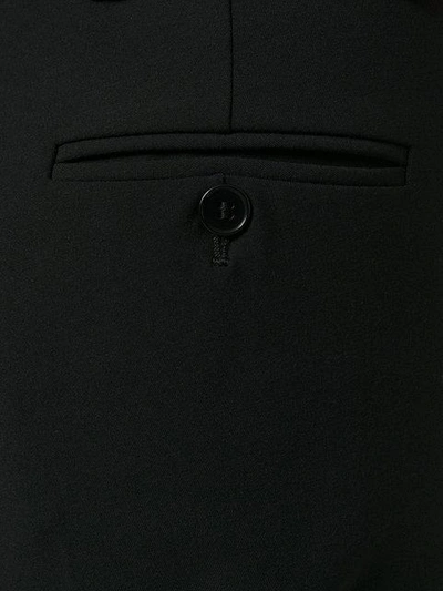 Shop Jw Anderson Knot Hem Trousers In Black