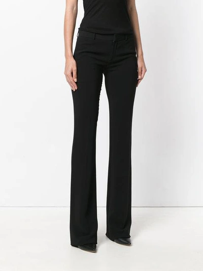 Shop Givenchy Slim Fit Flared Trousers - Black
