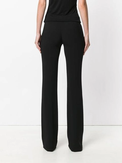 slim fit flared trousers