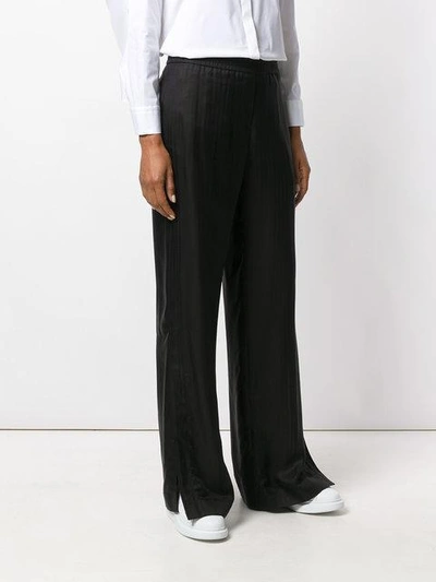 Shop Neil Barrett Wide Leg Trousers - Black