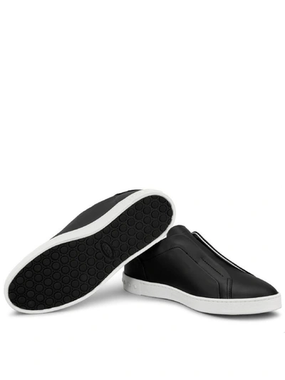 Shop Tod's Smooth Leather Slip-ons In Black