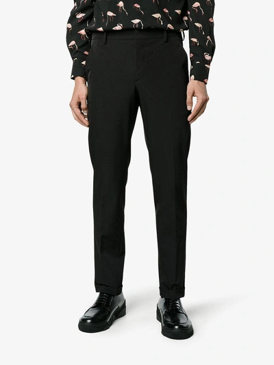 Shop Prada Turn Up Tailored Trousers In Black