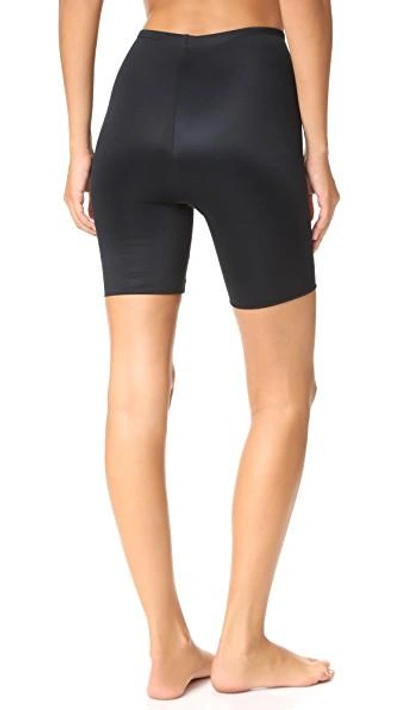 Shop Spanx Power Conceal-her Mid-thigh Shorts In Very Black