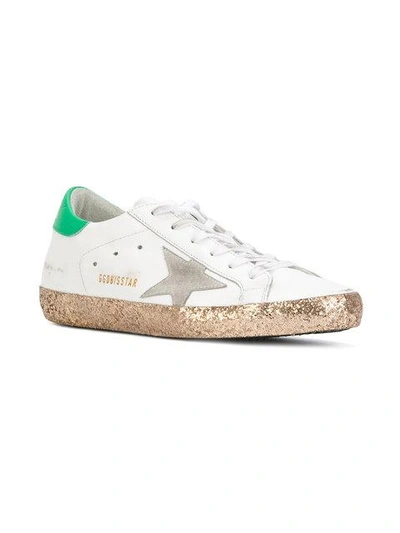 Shop Golden Goose Super Star Sneakers - White