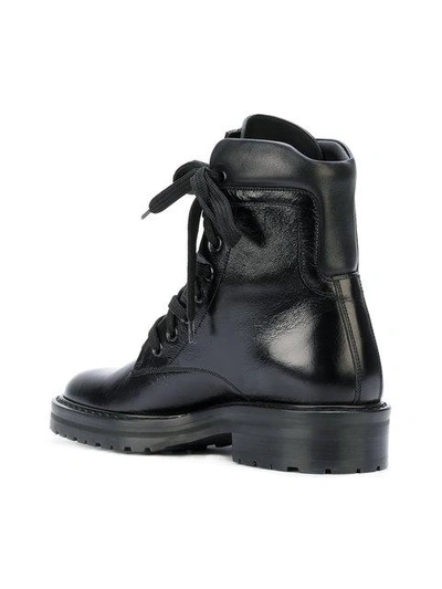 Shop Saint Laurent William 25 Front Zip Boots - Black