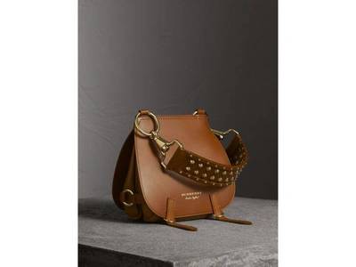 Shop Burberry The Bridle Bag In Leather And Rivets In Tan