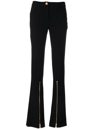 Shop Boutique Moschino Front Zip Flared Trousers