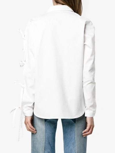 Shop Sandy Liang Noah Long Sleeve Bow Shirt In White
