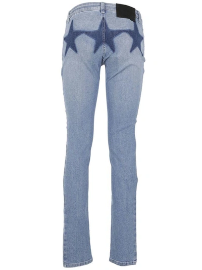 Shop Givenchy : Denim Star Print Skinny Jeans