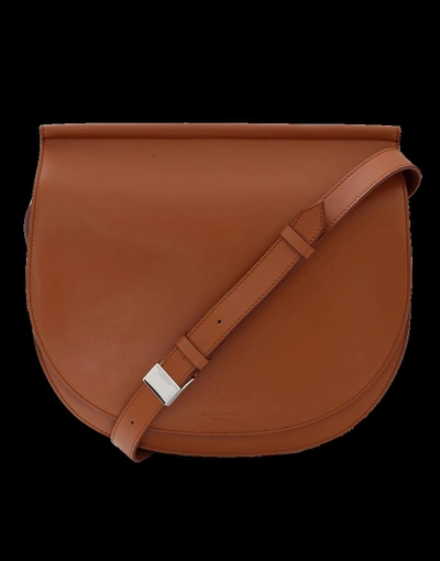 Shop Givenchy Infinity Leather Saddle Bag In Cognac