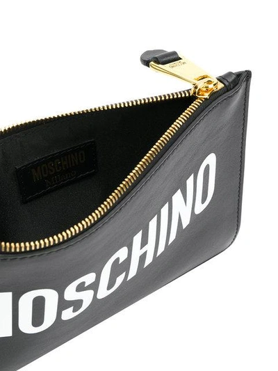 Shop Moschino Logo Print Clutch - Black