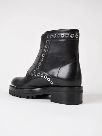 Shop Alexander Mcqueen Eyelet Ankle Boots In Black