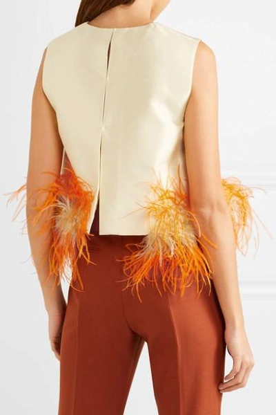 Shop Prada Feather-trimmed Wool And Silk-blend Top In Pastel Yellow