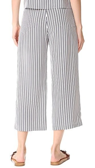 Shop Jenni Kayne Drawstring Crop Pants In Ivory/black/blue