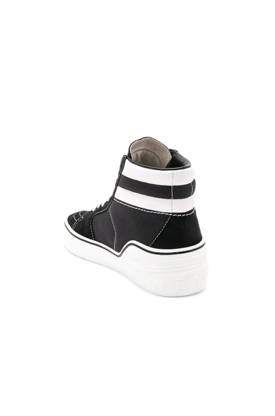 Shop Givenchy Mid Top Sneakers In Black