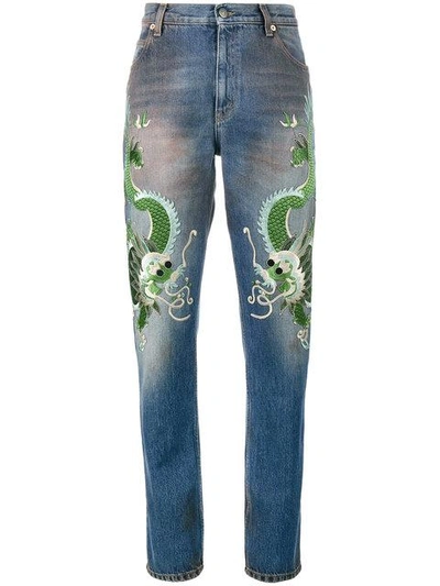 Shop Gucci Embroidered Dragon Jeans In Blue