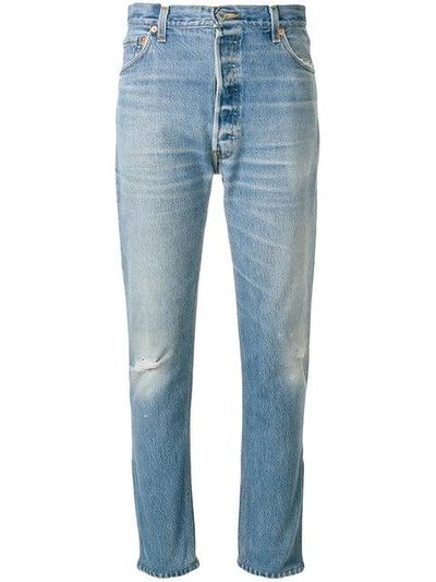 Shop Re/done Distressed Fitted Jeans In Blue