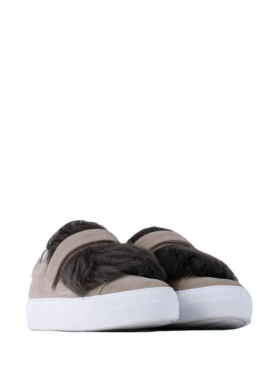 Shop Moncler Dark Sand Leather Woman Sneakers With Shearling Fur In 902
