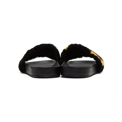 Shop Fendi Black Shearling Logo Slides