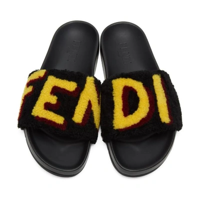 Shop Fendi Black Shearling Logo Slides