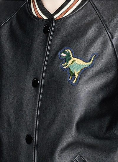 Shop Coach Rexy Patch Lambskin Leather Varsity Jacket