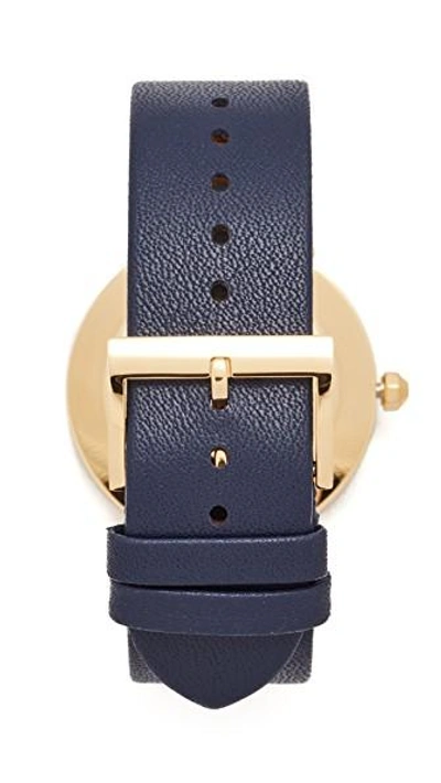 Shop Tory Burch The Reva Leather Watch In Gold/navy