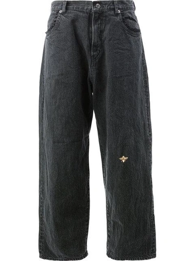 Shop Undercover Bee Embroidered Flared Jeans
