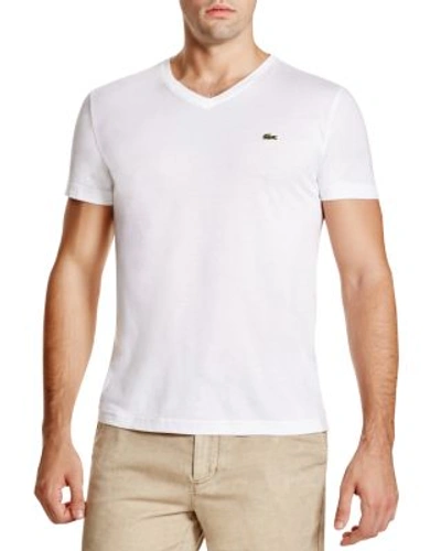 Shop Lacoste Solid V-neck Tee In White