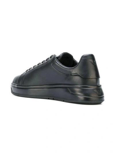 Shop Emporio Armani Embossed Logo Sneakers - Black