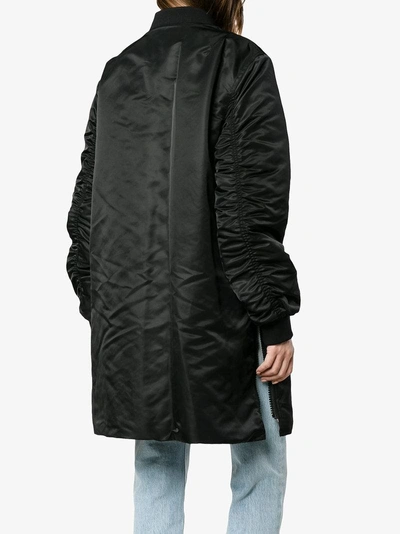Shop Acne Studios Coos Long Branded Bomber Jacket In Black