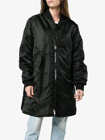 Shop Acne Studios Coos Long Branded Bomber Jacket In Black