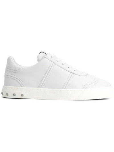 Shop Valentino Garavani Rockstud Sneakers - White