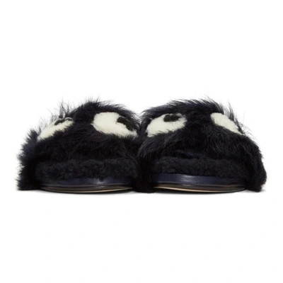 Shop Anya Hindmarch Blue Shearling Eye Slides