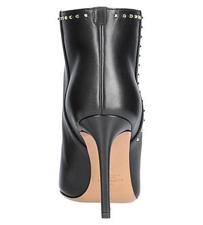 Shop Valentino Lovestud Leather Ankle Boots In Black