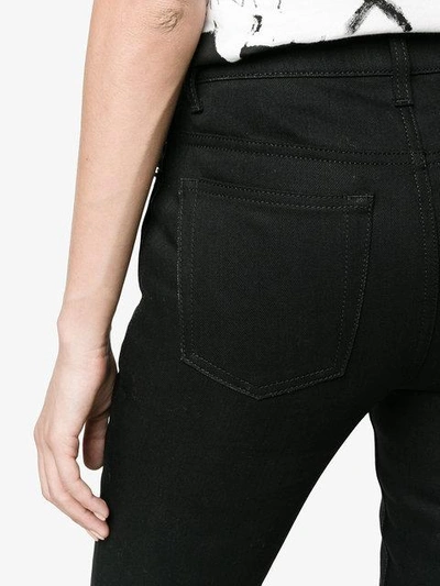 Shop Saint Laurent Black Original Mid Rise Skinny Jeans