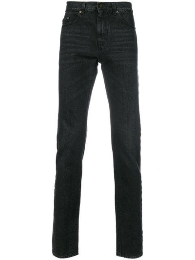 Shop Saint Laurent Original Low Waisted Jeans