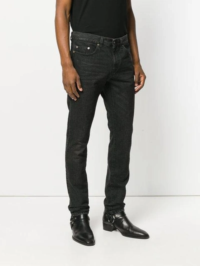 Shop Saint Laurent Original Low Waisted Jeans