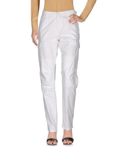 Shop Carhartt Casual Pants In White