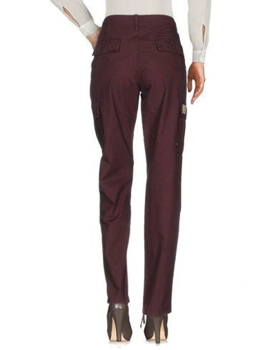 Shop Carhartt Casual Pants In Deep Purple