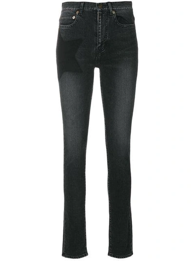 Shop Saint Laurent Star Skinny Jeans - Black