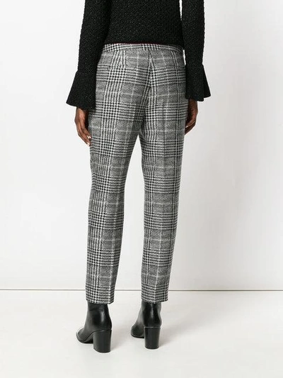 Shop Fendi Dogtooth Tapered Trousers - Black