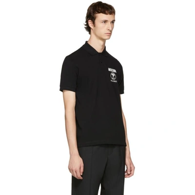 Shop Moschino Black Logo Polo In J0555 - Black