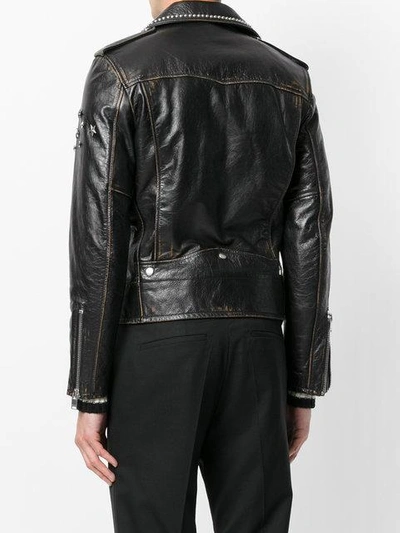 Shop Saint Laurent Studded Biker Jacket In Black