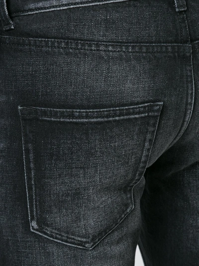 Shop Saint Laurent Slim-fit Knee Hole Jeans